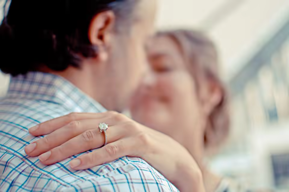 Couple with an engagement ring