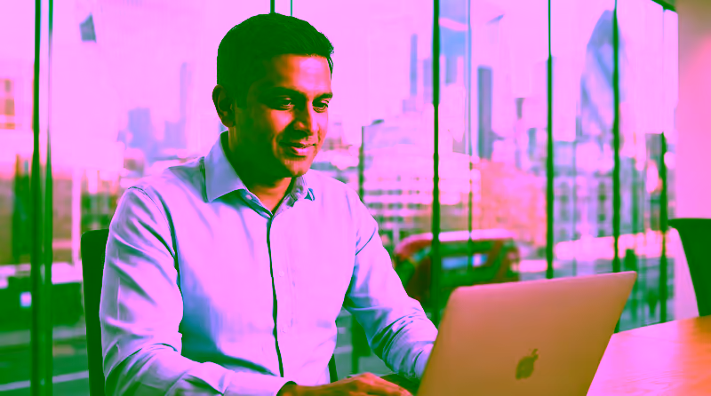 Skilled Worker visa solicitors advising a professional in a London office
